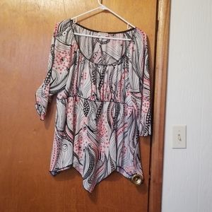 Cream and black blouse.